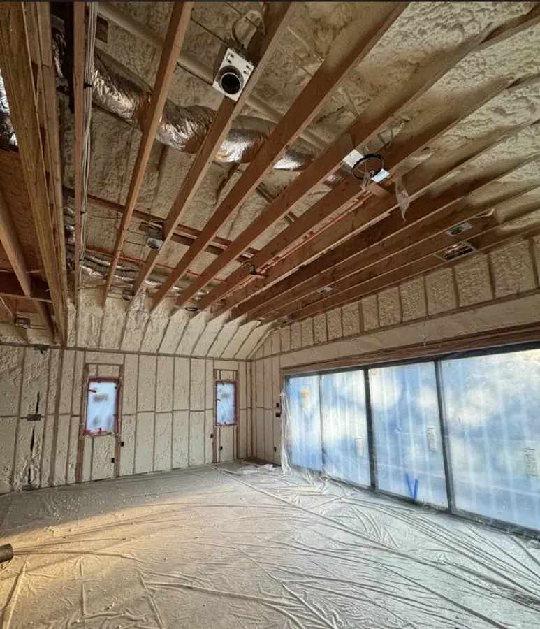 Interior walls and ceiling insulated with spray foam during new construction in Casselberry